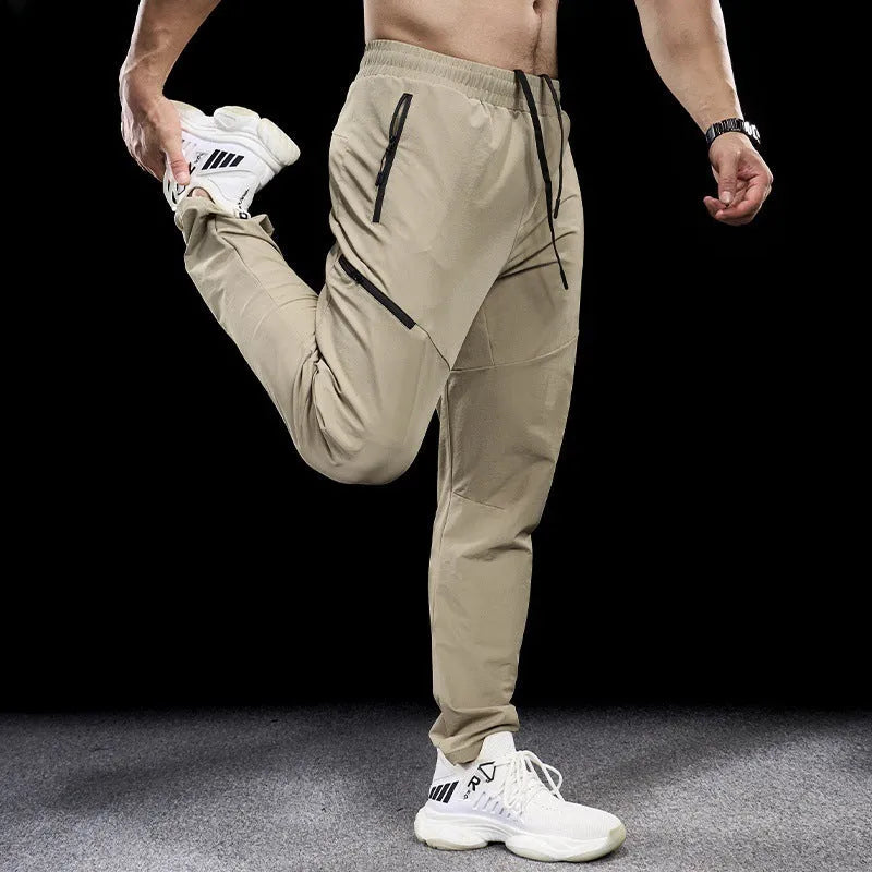 Men's Army Green waterproof quick-drying nylon workout pants, trousers length with mid waist.