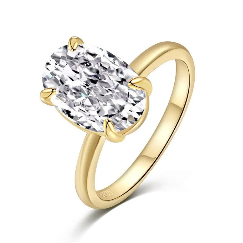 Oval silver ring with four-claw setting displaying hand-cut gemstone centrepiece