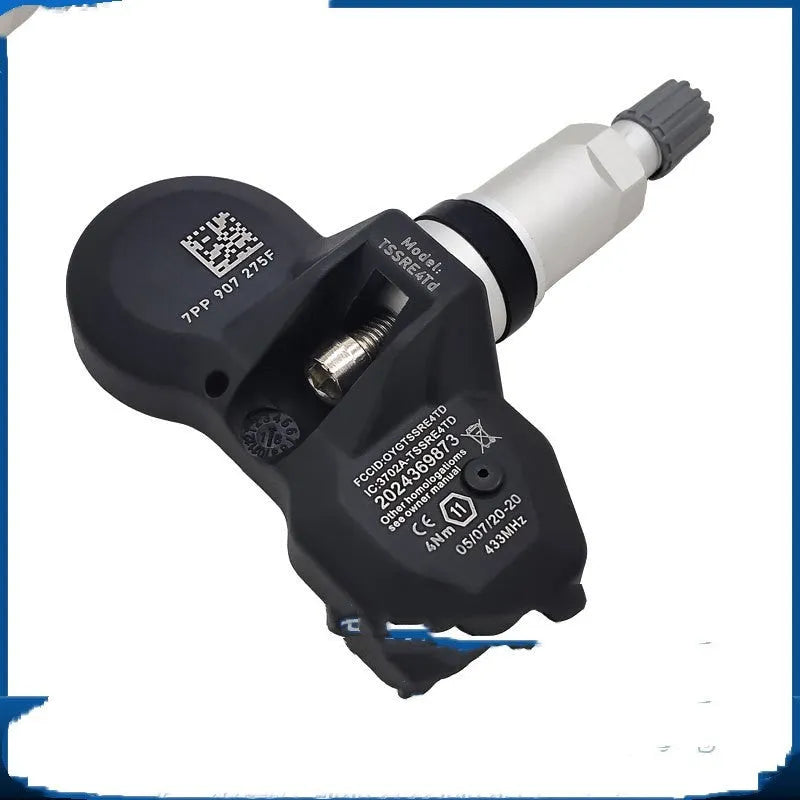 Black Audi tyre pressure monitoring sensor with valve stem for direct factory replacement