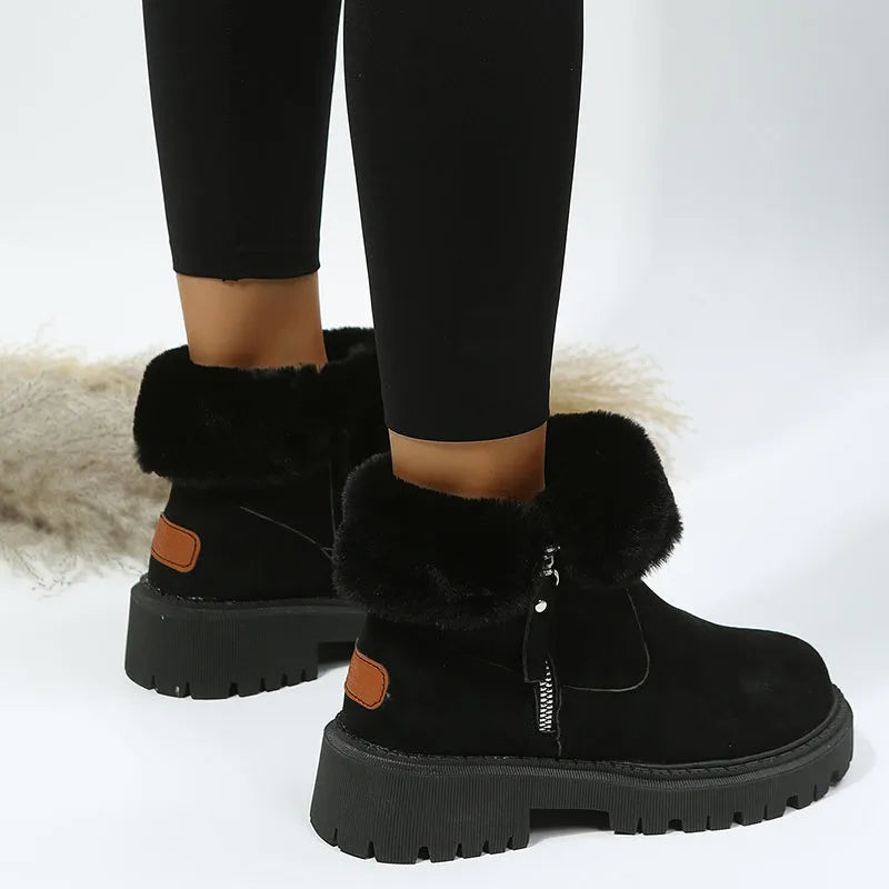 Women's black thick plush snow boots with side zipper, faux suede upper, and non-slip rubber sole.