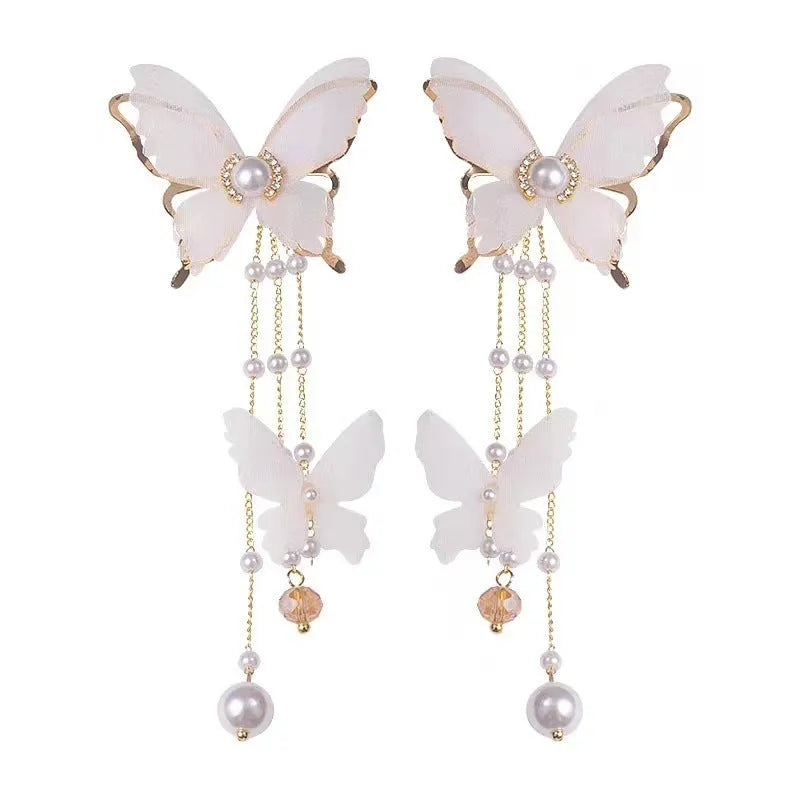 White butterfly earrings with tassel lace and pearl rhinestone decorative details