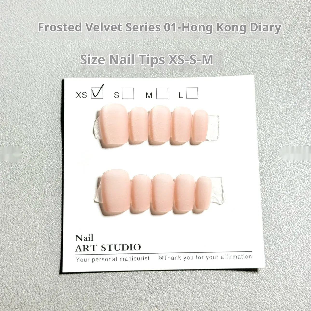 Frosted Velvet Cat's Eye false nail set showing electroplated design on short ladder sized PVC nails