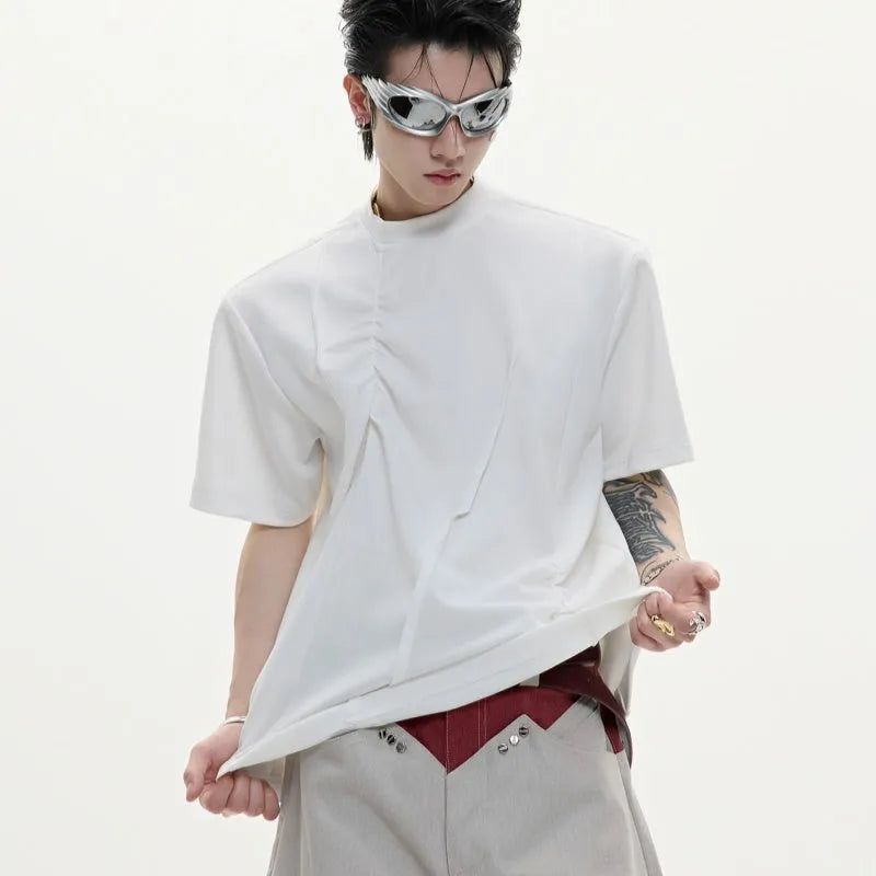 Men's loose-fit cotton T-shirt with three-dimensional pleats and asymmetric stitching in solid colour