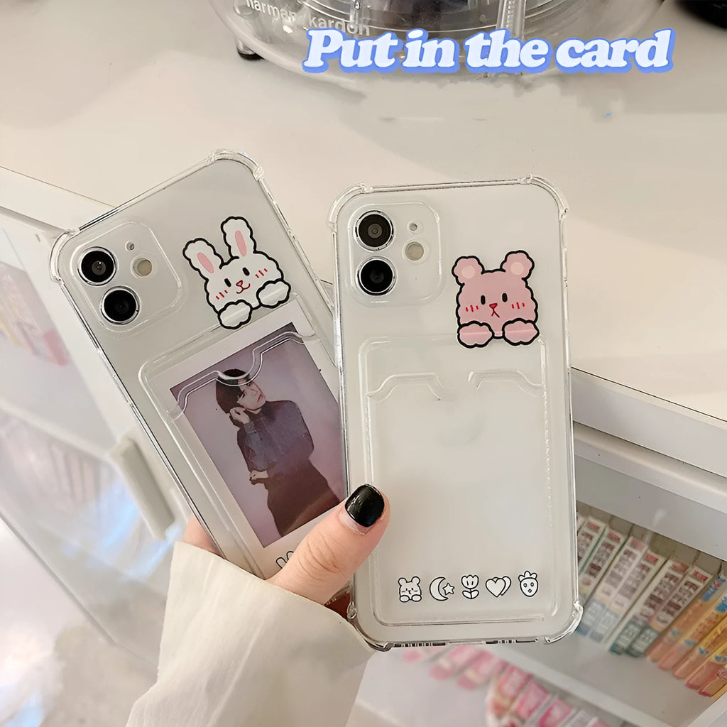 Transparent cartoon-design iPhone case with a card slot on the back, shown in colour options BQ2472 and BQ2473.