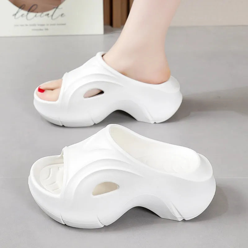 Women's thick-soled EVA slippers in white colour with round toe design