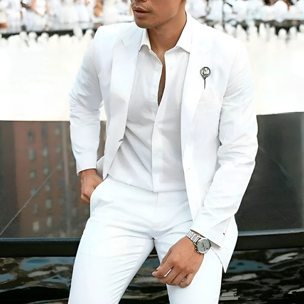 Men's white two-piece slim fit suit jacket and trousers for weddings.