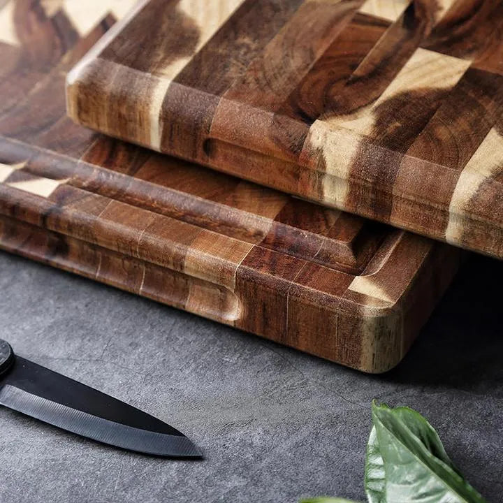 Brown acacia solid wood chopping board with parquet pattern, showing 3cm side thickness.