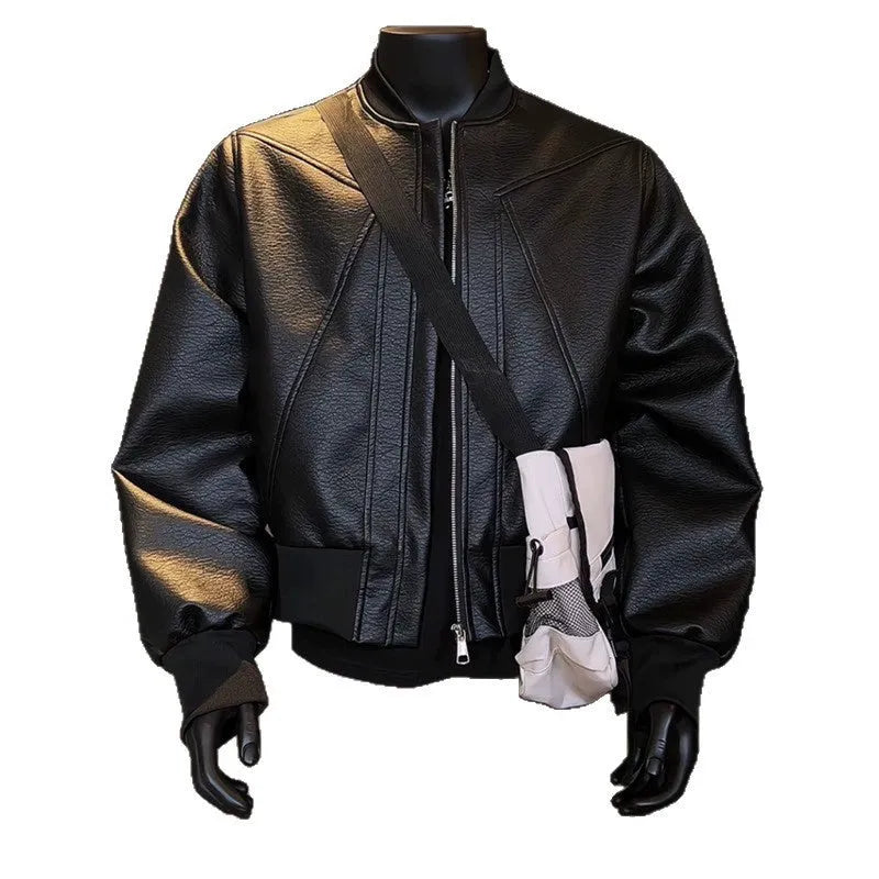 Men's black extended length PU leather jacket with litchi grain texture, shown in a tight business fit.