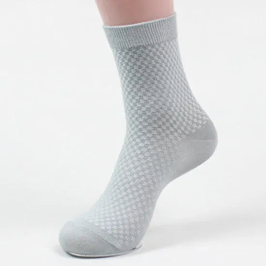 Men's bamboo fibre socks with a small square pattern in black, grey blue, iron grey, navy blue, and silver grey.