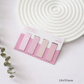 Set of four miniature magnetic bookmarks in Morandi colour block designs: soft blue, grey-green, dusty pink, and mauve.
