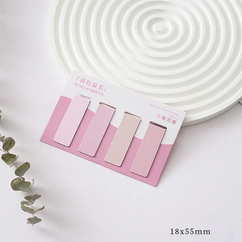 Set of four miniature magnetic bookmarks in Morandi colour block designs: soft blue, grey-green, dusty pink, and mauve.