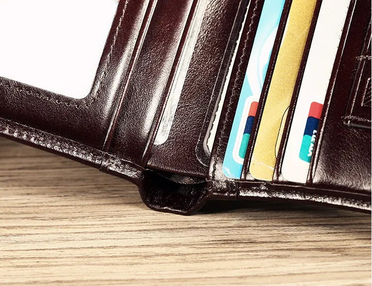 Men's leather wallet showing internal card slots, banknote folder, coin pocket, and document positions