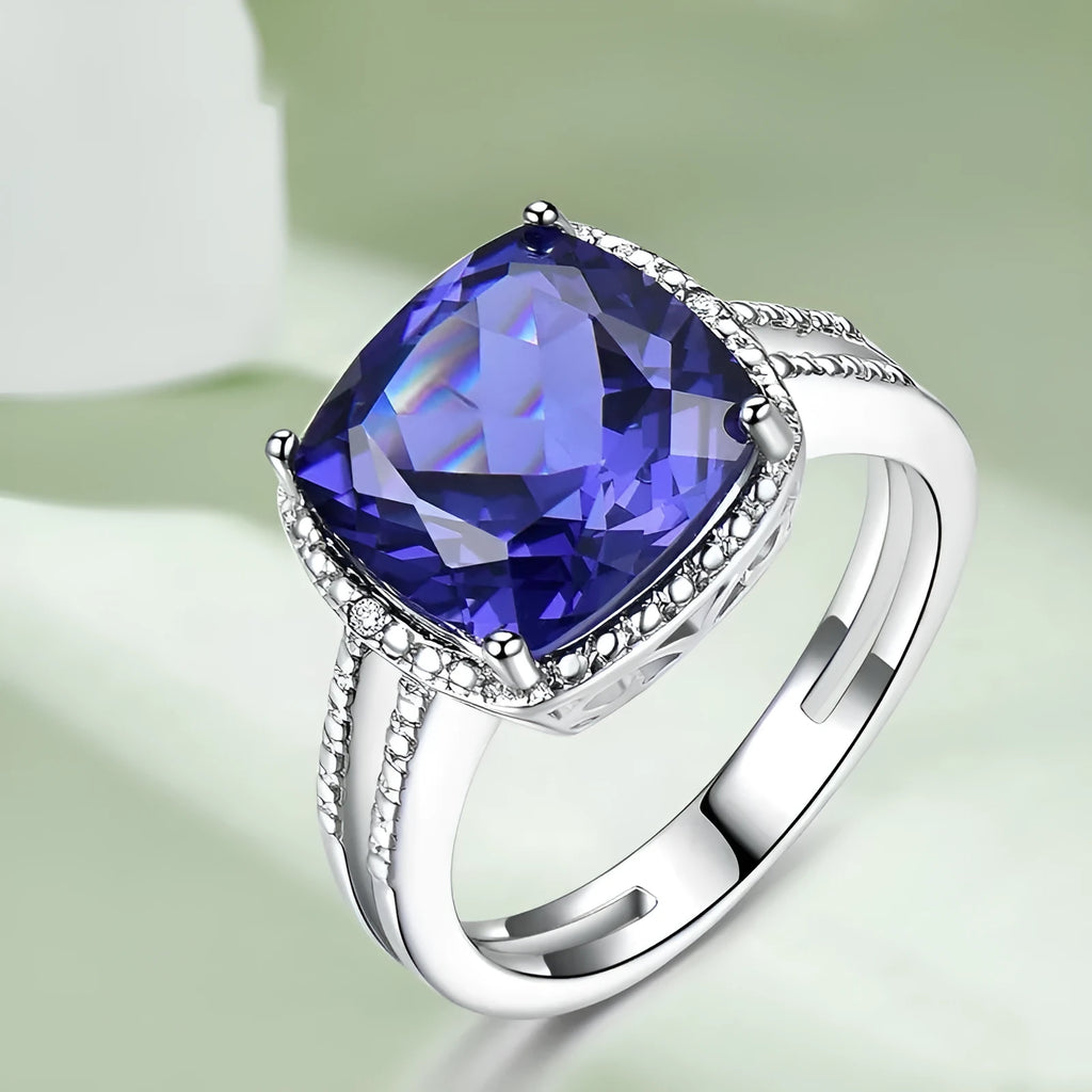 Women's sterling silver ring with a blue Tanzanite gemstone, shown in size 10.