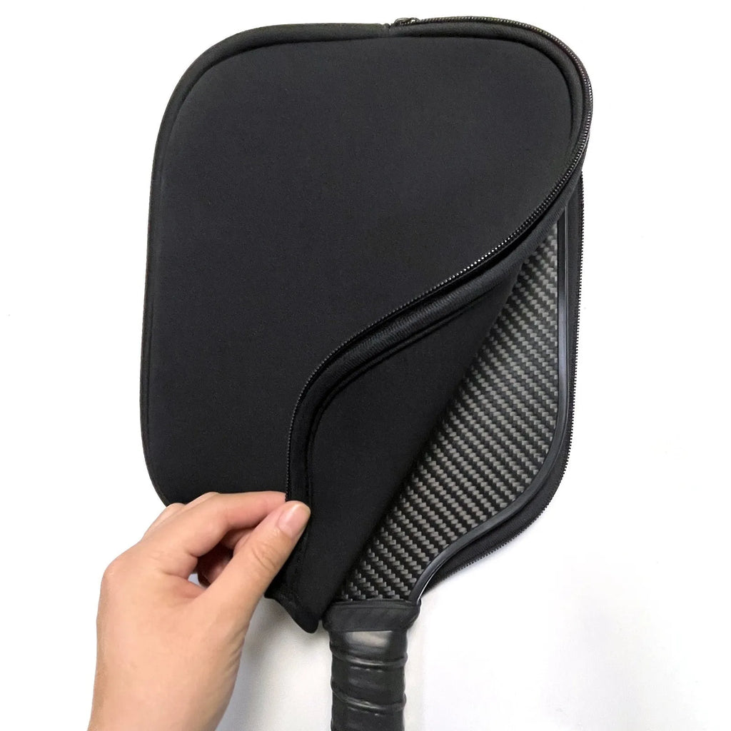 Black neoprene protective sleeve for a table tennis racket.