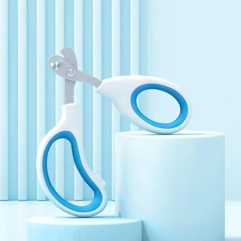 Blue handled cat nail clippers with circular cutting hole and stainless steel blade