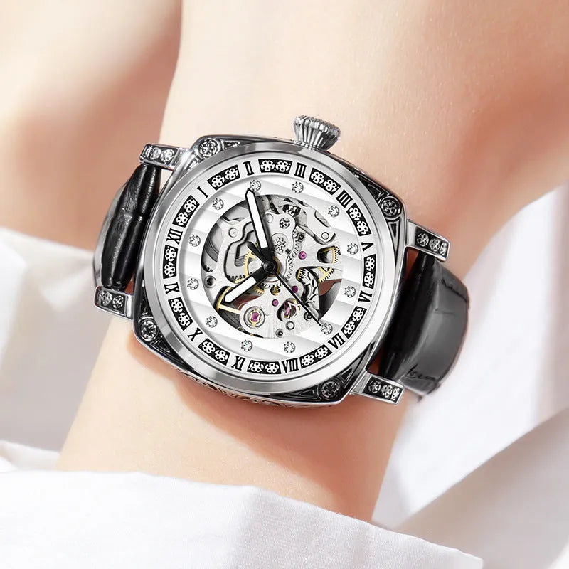 Leather strap mechanical watch with luminous hands showing black dial option