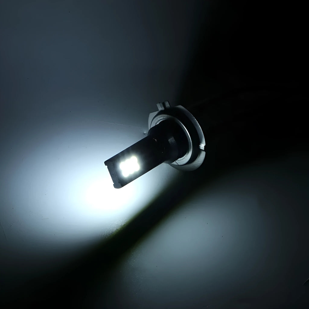 H7 110W 12SMD 3030 LED car fog light bulb with white aluminium housing.