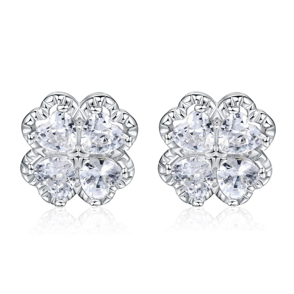 Pair of 925 silver heart-shaped earrings with inlaid zircon stones and a white gold colour finish.