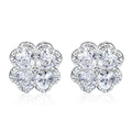 Pair of 925 silver heart-shaped earrings with inlaid zircon stones and a white gold colour finish.