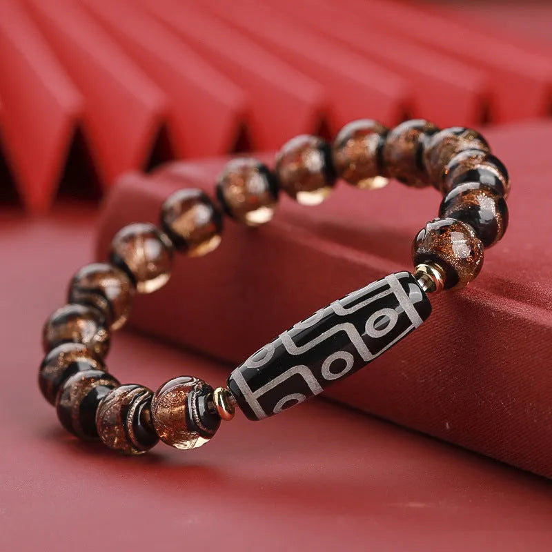 Chinese coloured glaze bracelet with snake beads in five-colour design, showing manual processing details