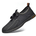 Men's black breathable mesh casual summer shoes with elastic slip-on band and rubber sole