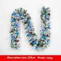 PVC Christmas rattan garland with flocked finish in golden colour option draped over mantelpiece