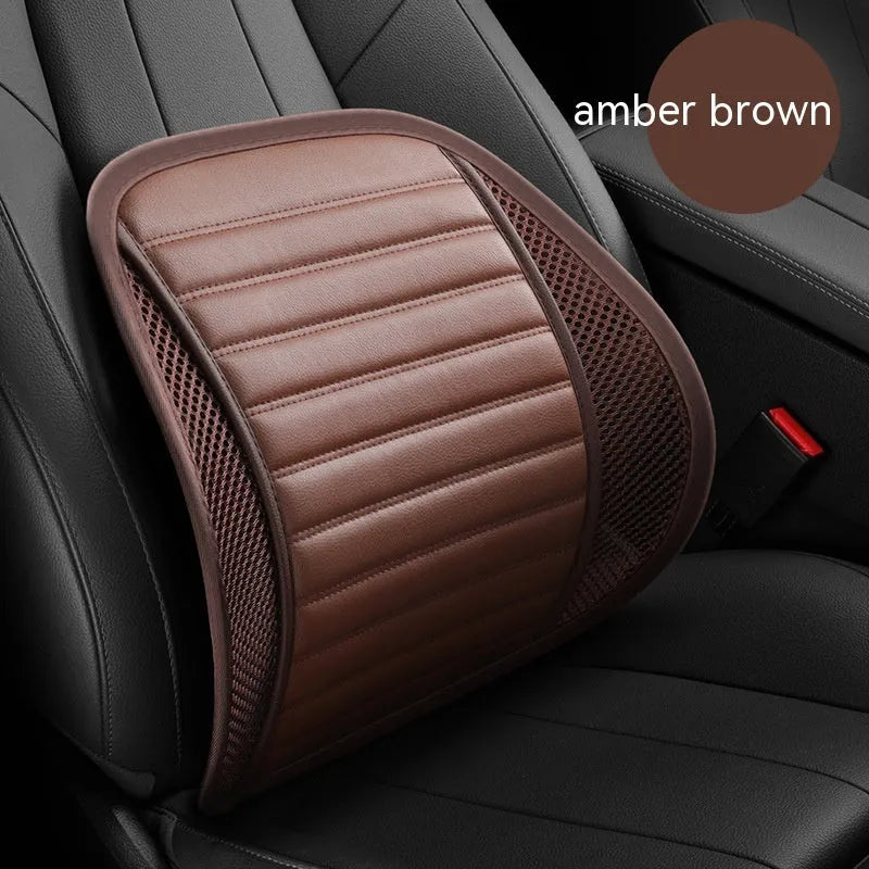 Leather lumbar support cushion on car seat in sapphire blue colour