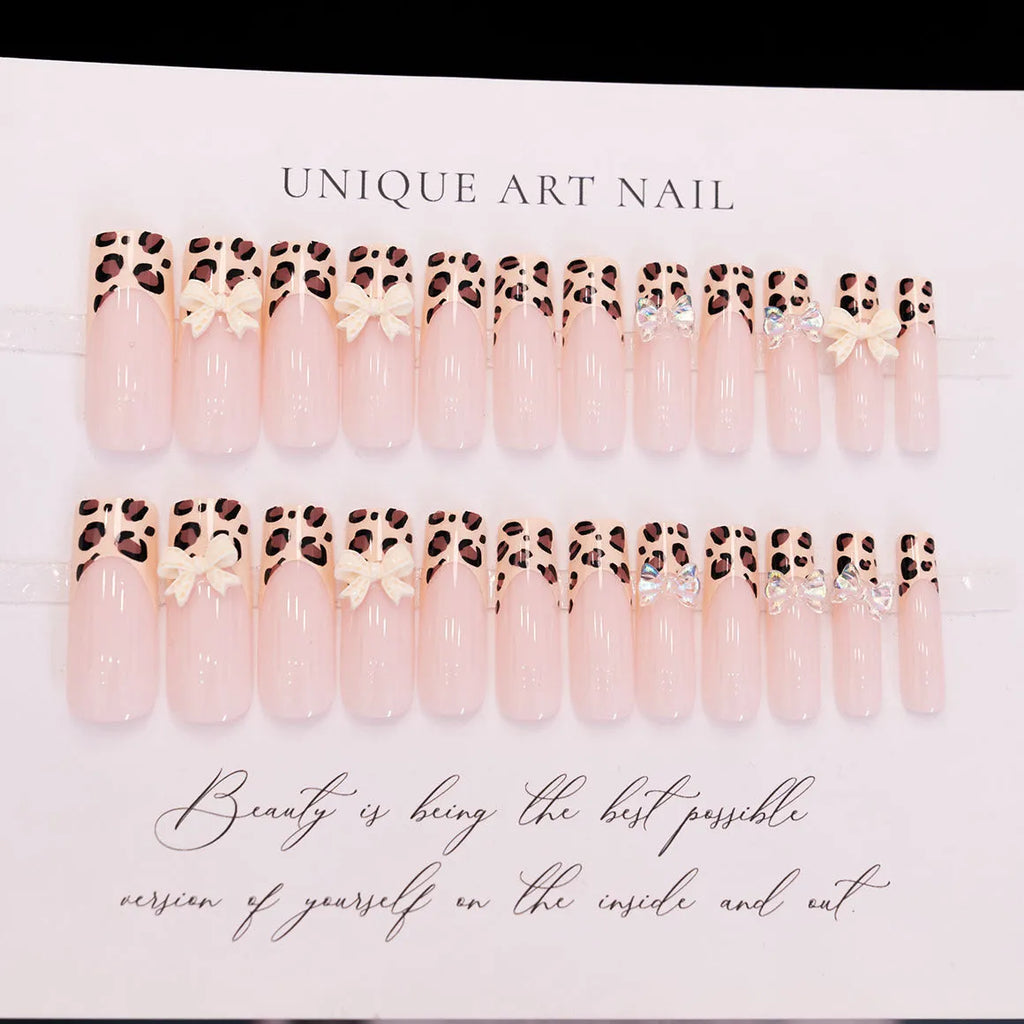 Leopard print and butterfly design false nails in WM296 colour, plastic construction