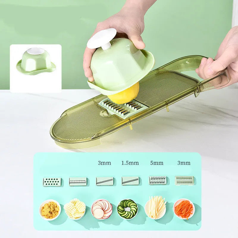 Transparent green multifunction vegetable cutter with six stainless steel blade heads and a large capacity box