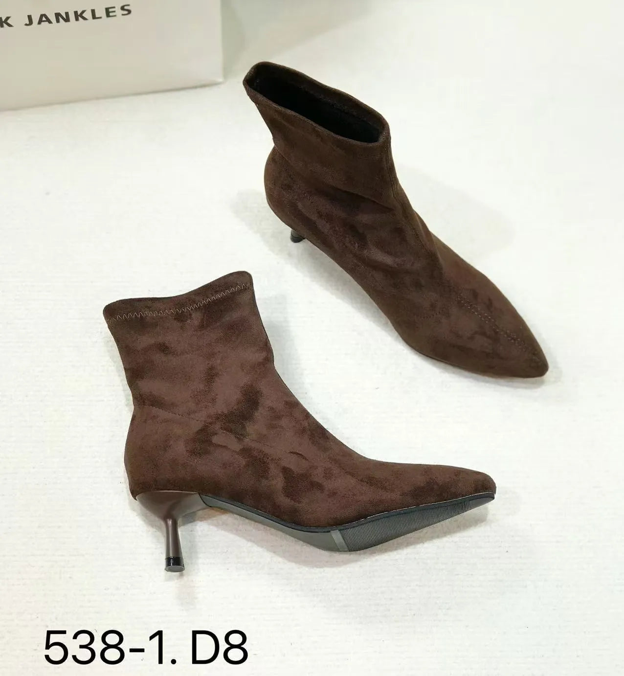 Black pointed toe stiletto heel ankle boots with microfiber upper and mid-calf length