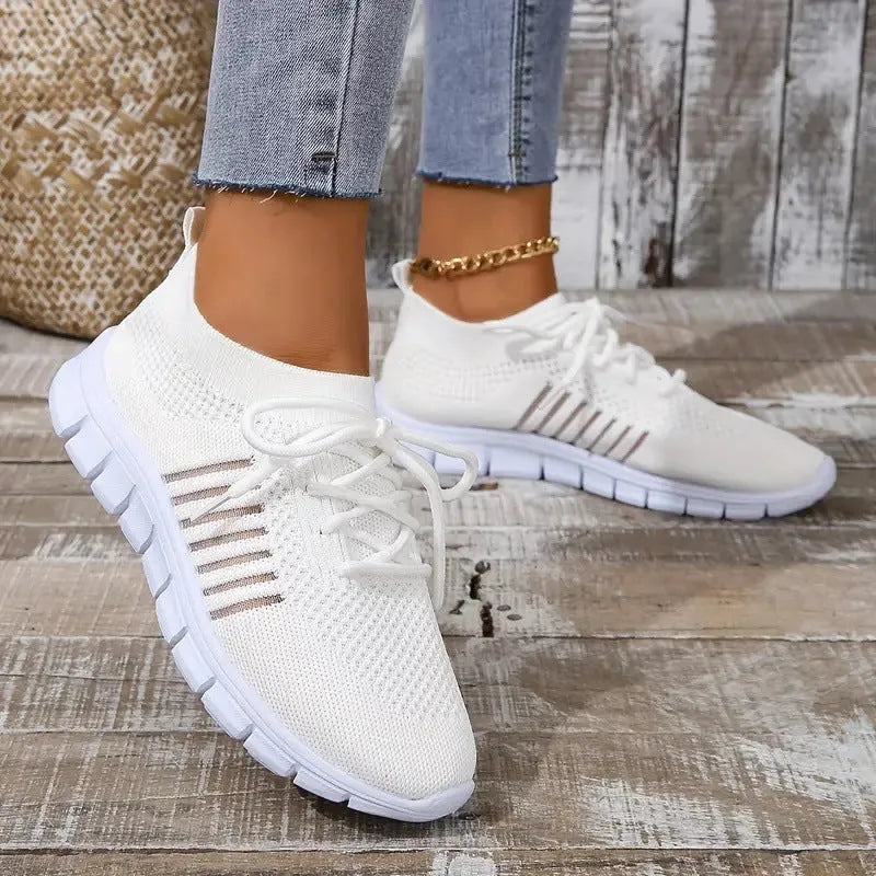 Women's breathable flying knit flat shoes with mesh upper and front tie in various colours