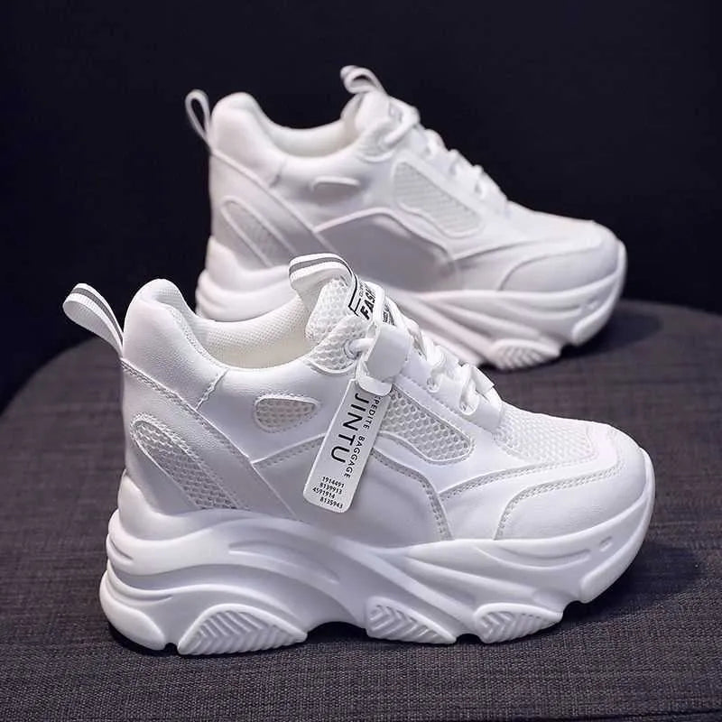 Women's black mesh platform casual shoe with a fleece lining and TPR sole.