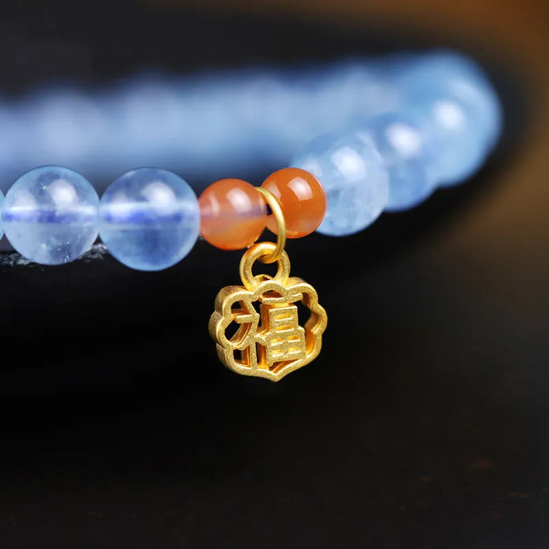 Natural aquamarine crystal blessing card bracelet with icy translucent 8mm round beads and sequin accents.