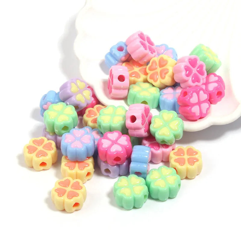 15mm acrylic four-leaf clover beads with frosted finish in various colours including rose red, pink, yellow, green, blue, purple