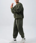 Men's black polar fleece sports suit with padded crew-neck coat and matching trousers