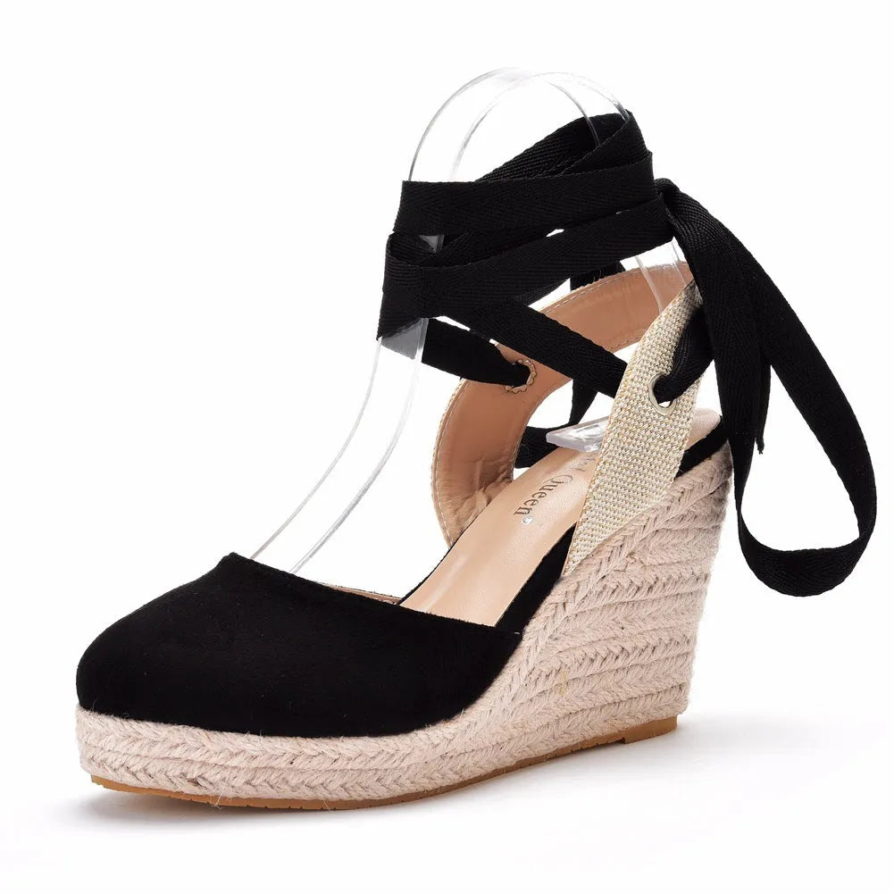 Women's bohemian wedge sandals with beading, tassels, buckle closure, and a wedge heel