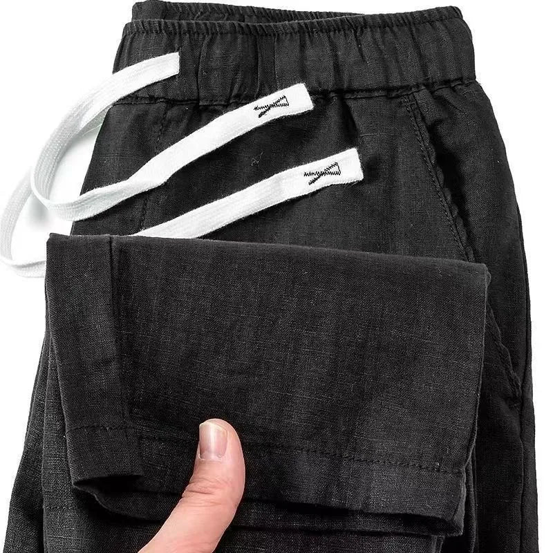Pure linen Chinese style trousers with elastic waistband in straight leg silhouette
