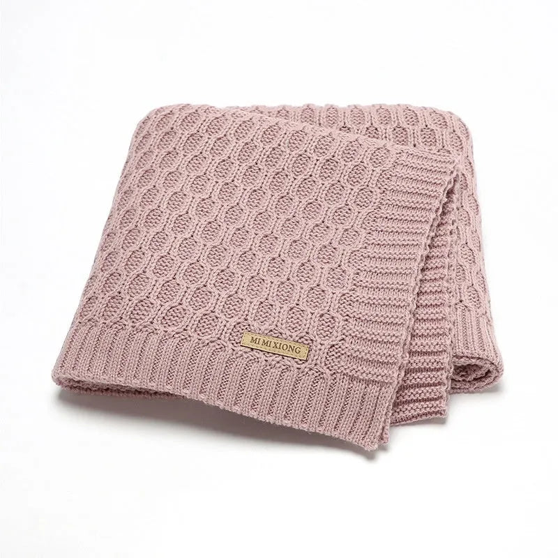 Solid colour acrylic infant hug blanket measuring 70×90cm in pink, beige khaki, bleached, light green, and medium grey options