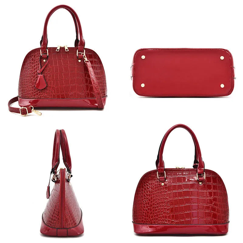 Large shiny PU leather crossbody bag in shell shape design on adjustable strap