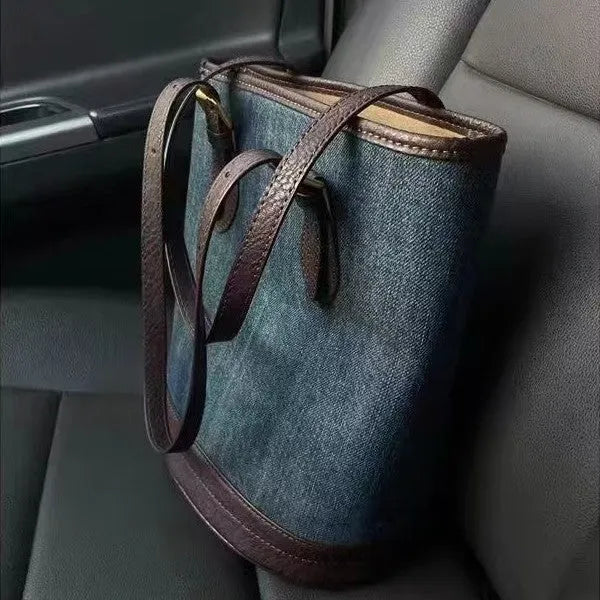 Denim colour patchwork handbag with retro bucket design showing 23cm width, 27cm height dimensions