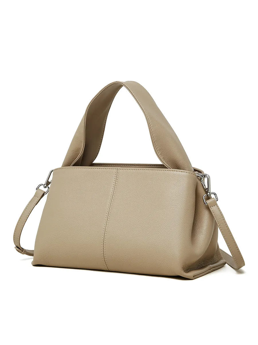 Genuine cowhide messenger bag in horizontal square shape with double shoulder straps and retro texture