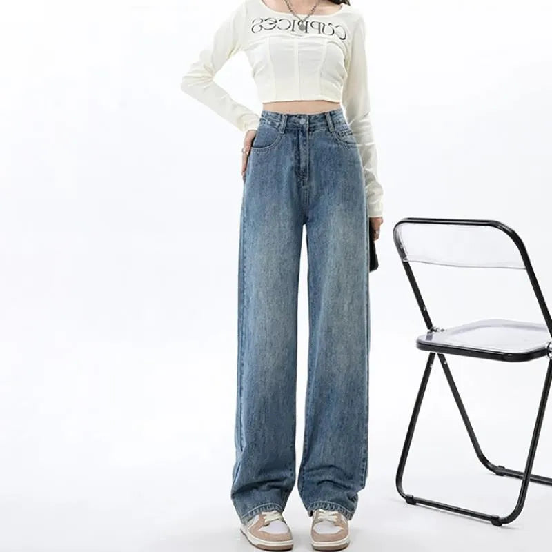 Women's high waist wide leg jeans in retro blue denim with straight leg silhouette