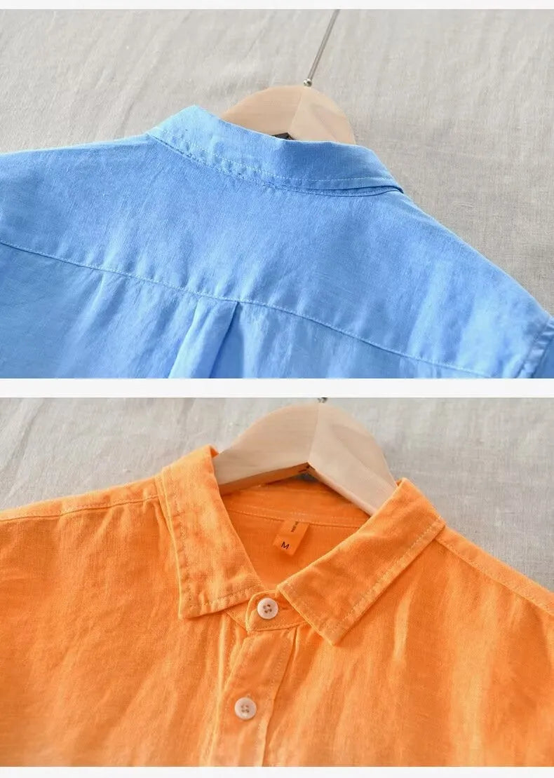 A dark blue loose fit casual top coat for teenagers on a hanger, showing the slim-fit silhouette.