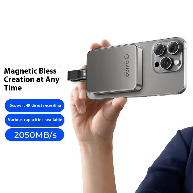 Grey magnetic mobile solid state drive with ultra-thin 80x60mm dimensions and magnetic attachment ring