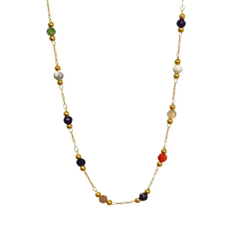 Gold electroplated titanium steel necklace with a natural stone pendant on an O-ring chain.