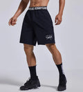 Men's loose sports shorts in black with letter detailing and elastic fly opening