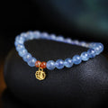 Natural aquamarine crystal blessing card bracelet with icy translucent 8mm round beads and sequin accents.
