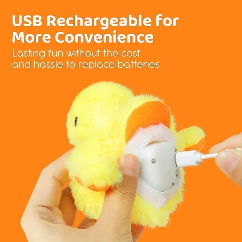 Yellow flapping duck plush cat toy with vibration sensor on a grey background.