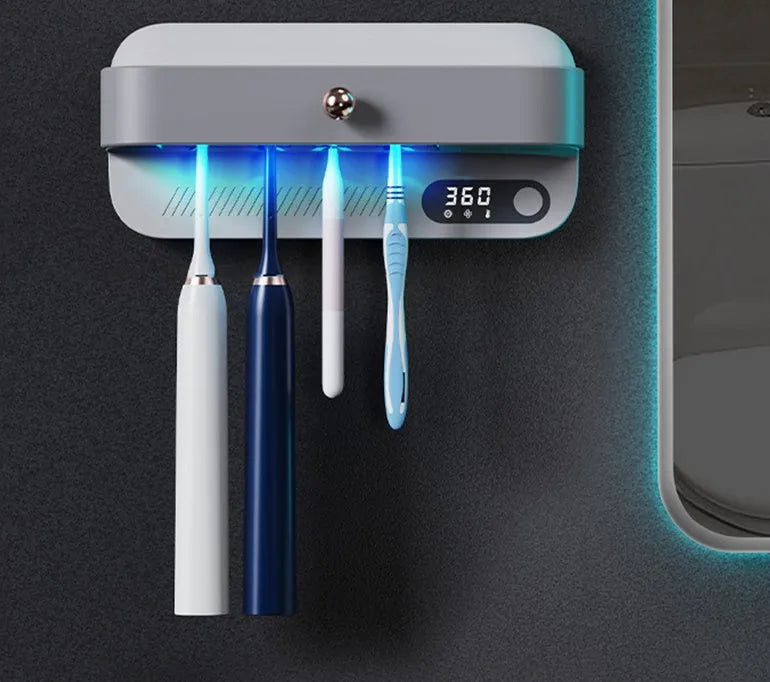 White wall-mounted smart toothbrush steriliser with USB charging port and button control