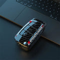 Carbon fibre style car key cover in carbon and white colours with mirror element